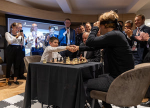 Le grand espoir français Marc Llari (9 ans) affronte Magnus Carlsen !